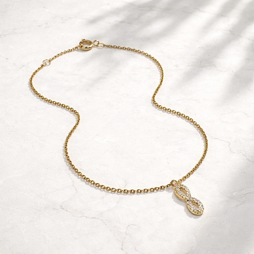 Chaîne de cheville Ananta en plaqué or et zirconium, infini - Bijoux MOONSTRA