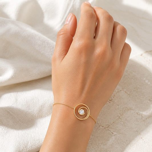 Bracelet Calypso en plaqué or et oxydes de zirconium en spirale -  Bijoux MOONSTRA